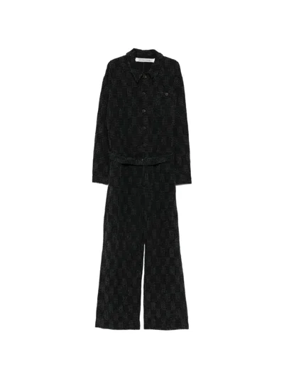 Individual Sentiments Belted Textured-finish Jumpsuit In Black