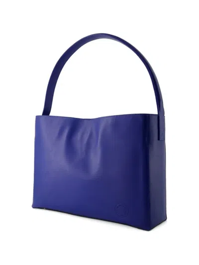 Ines De La Fressange Bottega Veneta Jodie In Suede In Blue