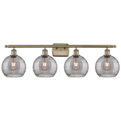 Innovations Lighting Ballston Athens 38"w 4-light Antique Brass Bath Light W/ Smoke Swirl S