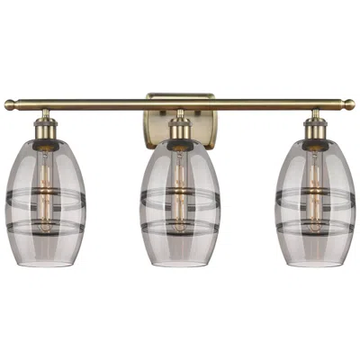 Innovations Lighting Ballston Vaz 25.88"w 3 Light Antique Brass Bath Light W/ 6" Smoke
