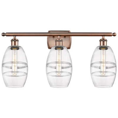 Innovations Lighting Ballston Vaz 25.88"w 3 Light Antique Copper Bath Light W/ 6" Clea