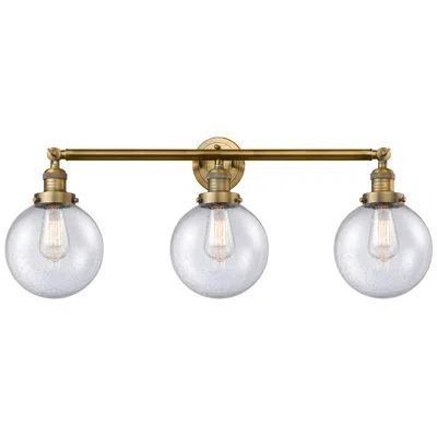 Innovations Lighting Beacon 3 Light 32" Bath Light - Brushed Brass - Seedy Shade