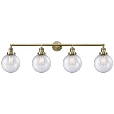 Innovations Lighting Beacon 4 Light 44" Bath Light - Antique Brass - Seedy Shade