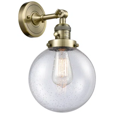 Innovations Lighting Beacon 8" Antique Brass Sconce W/ Seedy Shade