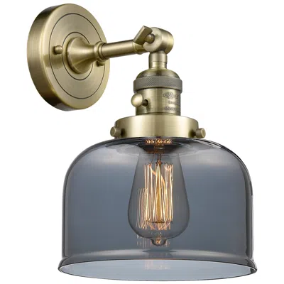Innovations Lighting Bell 8" Antique Brass Sconce W/ Plated Smoke Shade
