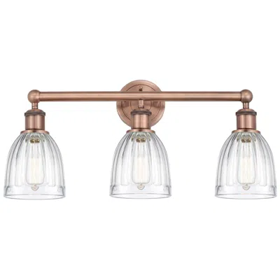Innovations Lighting Brookfield 23.75"w 3 Light Antique Copper Bath Light With Clear Shade