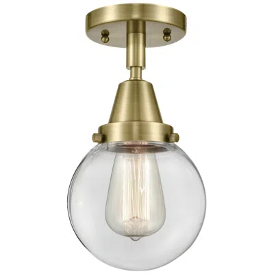 Innovations Lighting Caden Beacon 6" Led Flush Mount - Antique Brass - Clear Shade