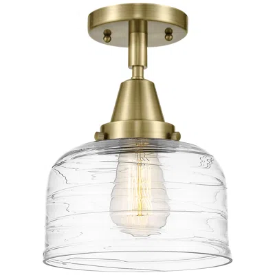 Innovations Lighting Caden Bell 8" Flush Mount - Antique Brass - Clear Deco Swirl Shade