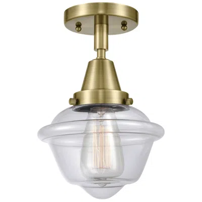 Innovations Lighting Caden Oxford 7.5" Wide Antique Brass Flush Mount With Clear Shade