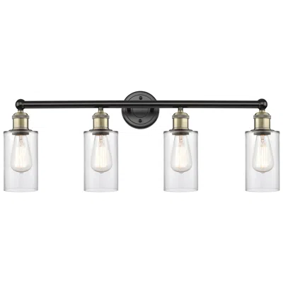 Innovations Lighting Clymer 30.88"w 4 Light Black Antique Brass Bath Light With Clear Shade