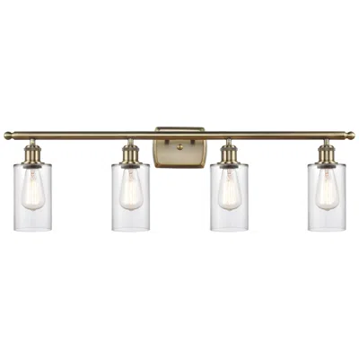 Innovations Lighting Clymer 36" Wide 4 Light Antique Brass Bath Vanity Light W/ Clear Shade