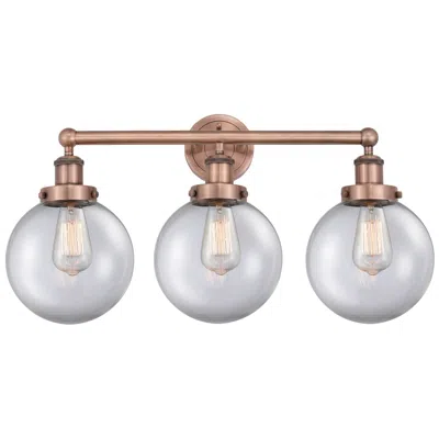 Innovations Lighting Edison Beacon 24.5"w 3 Light Antique Copper Bath Light With Clear Shad