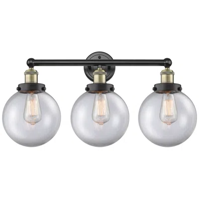 Innovations Lighting Edison Beacon 24.5"w 3 Light Black Brass Bath Light With Clear Shade