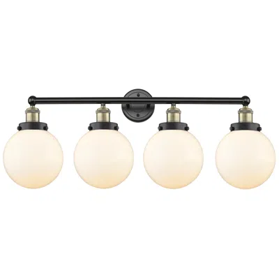 Innovations Lighting Large Beacon 33.5"w 4 Light Black Brass Bath Light W/ Matte White Shad