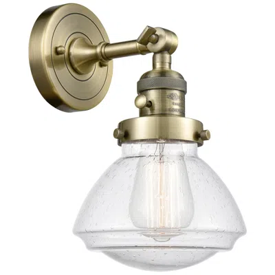 Innovations Lighting Olean 7.75" High Antique Brass Sconce W/ Seedy Shade