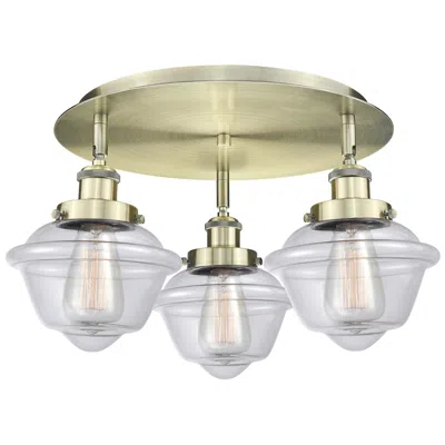 Innovations Lighting Oxford 18.25" Wide 3 Light Antique Brass Flush Mount With Clear Glass