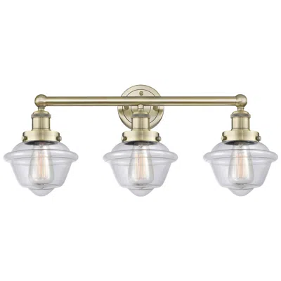 Innovations Lighting Oxford 24.5" Wide 3 Light Antique Brass Bath Vanity Light With Clear S