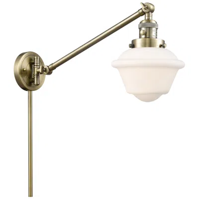 Innovations Lighting Oxford 25" High Antique Brass Swing Arm W/ Matte White Shade