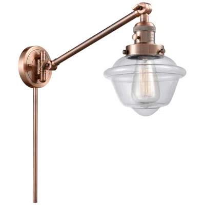 Innovations Lighting Oxford 25" High Copper Swing Arm W/ Clear Shade