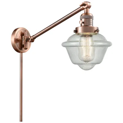 Innovations Lighting Oxford 25" High Copper Swing Arm W/ Seedy Shade
