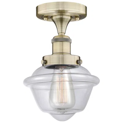 Innovations Lighting Oxford 6.5" Wide Antique Brass Semi.flush Mount With Clear Glass Shade