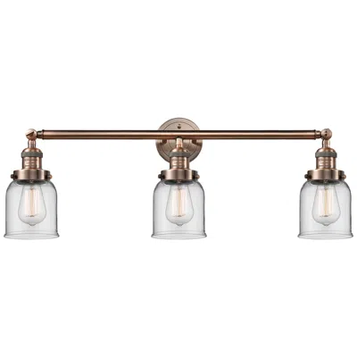 Innovations Lighting Small Bell 30" Wide Clear Glass Antique Copper Bath Light