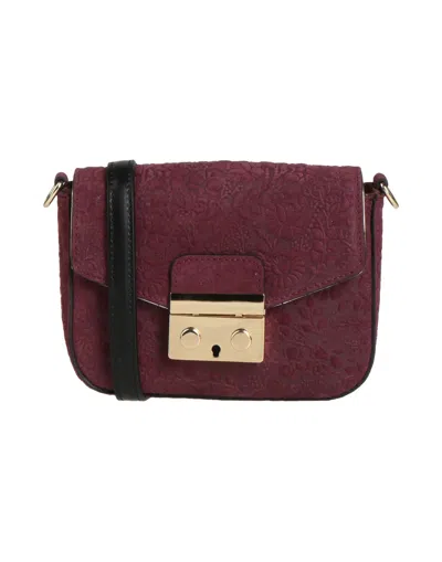 Innue' Handbags In Brown