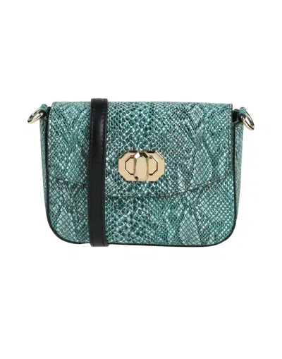 Innue' Handbags In Green