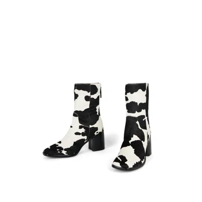 Intentionally Blank Pg Cow Print Boot In Black, Women's At Urban Outfitters
