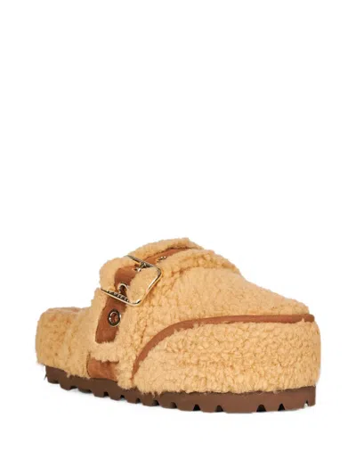 Inuikii Shearling Buckle-fastening Mules In Gold