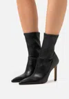 IRO ASPER LEATHER ANKLE BOOTS IN BLACK