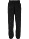 Iro Ozalee Logo-print Track Pants In Schwarz
