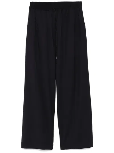 Isabel Benenato Pleat-detailing Trousers In Blue