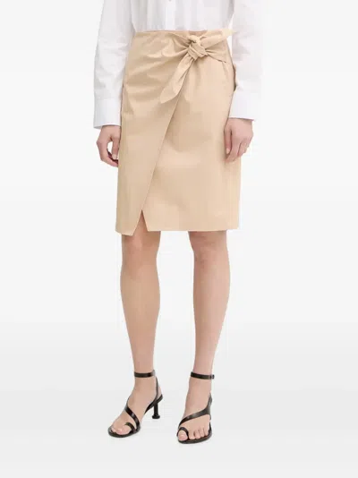 Isabelle Blanche Knot-detail Wrap Mini Skirt In Neutral