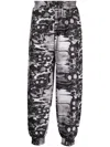 Iso.poetism Khumbu Abstract-print Track Pants In Black