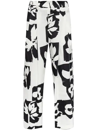 Issey Miyake Abstract-print Trousers In White
