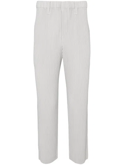 ISSEY MIYAKE BASIC TAPERED PLISSÉ TROUSERS