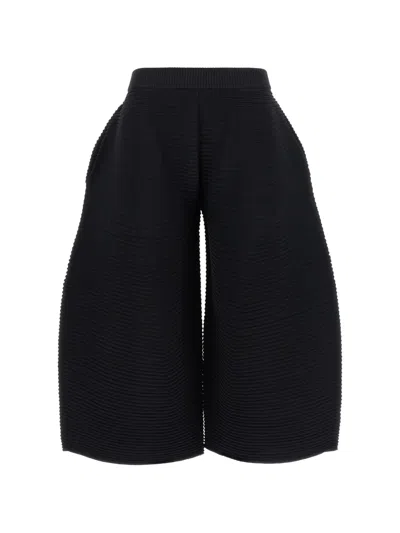 Issey Miyake Corrugated Knit Cropped Trousers In Black