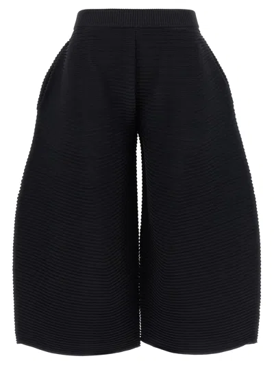 Issey Miyake Corrugated Knit Cropped Trousers In Black