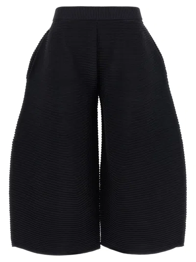 Issey Miyake Corrugated Knit Trousers In Black