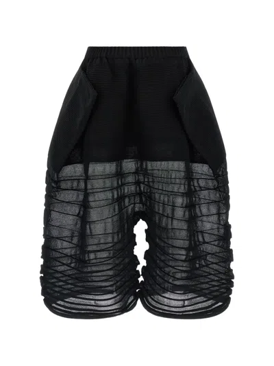 Issey Miyake Moving Knit Cropped Knitted Trousers In Black