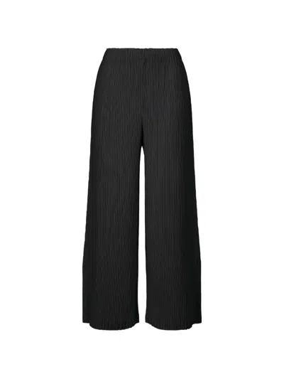 Issey Miyake Hatching Pleated Trousers In Black