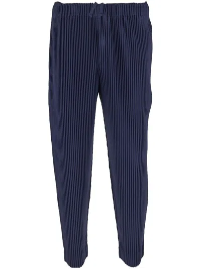 Issey Miyake Homme Plissé  Pleated Tapered Trousers In Blue