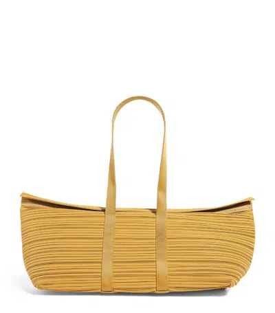 Issey Miyake Large Pleated Boston Tote Bag In Yellow