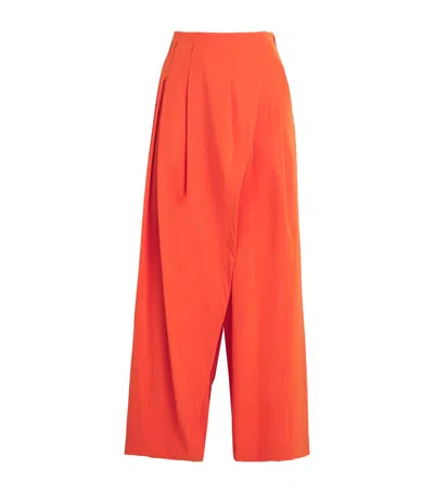 Issey Miyake Looped Wrap Trousers In Orange