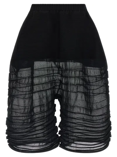 Issey Miyake Moving Knit Cropped Knitted Trousers In Black