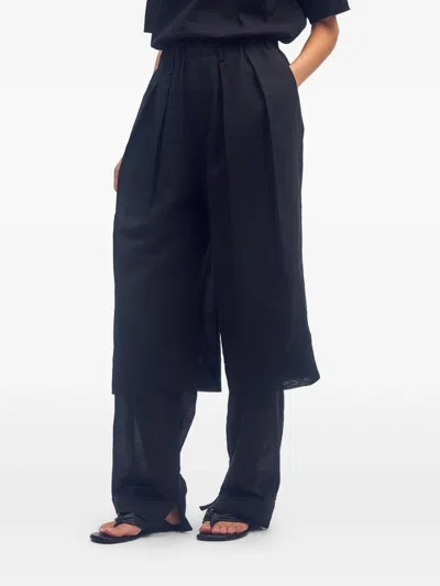 Issey Miyake Paper-esque Pleated Trousers In Black