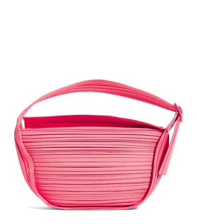 Issey Miyake Pleated Half-moon Shoulder Bag In Pink