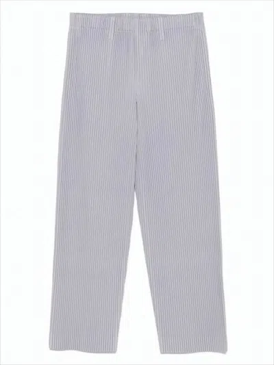 ISSEY MIYAKE PLEATED RELAXED FIT PANTS WITH SUBTLE VERTICAL STRIPES