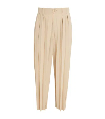 Issey Miyake Pleated Tapered Trousers In 40-beige